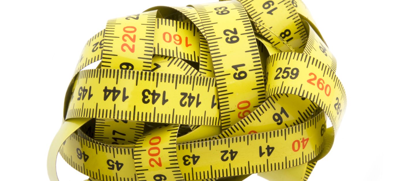 A close up of a measuring tape Description automatically generated
